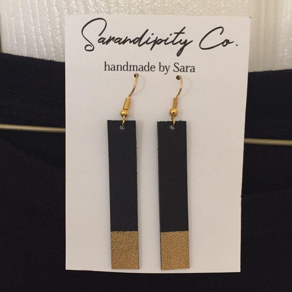 Leather black/gold earrings. Very lightweight.